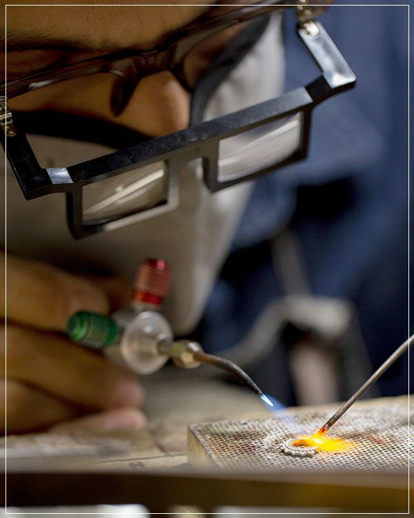 up close of a jeweller crafting a piece of jewellery